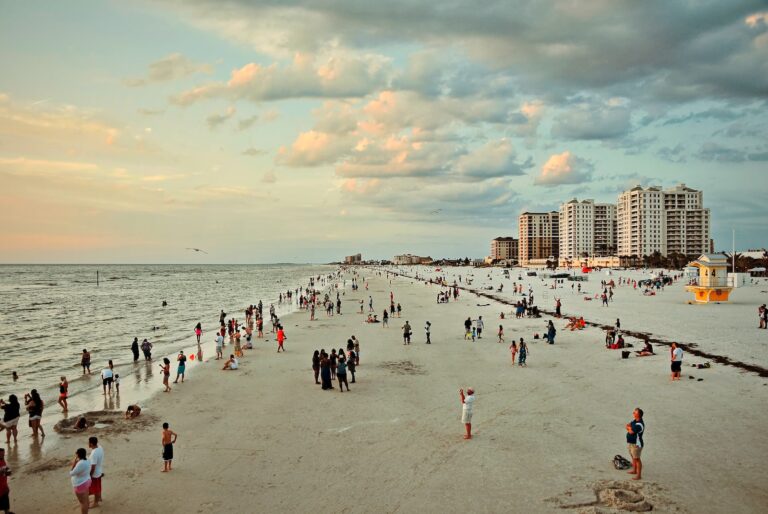 people on a Clearwater Florida beach during daytime