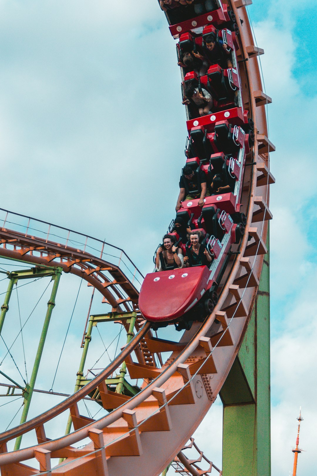a group of people riding a roller coaster