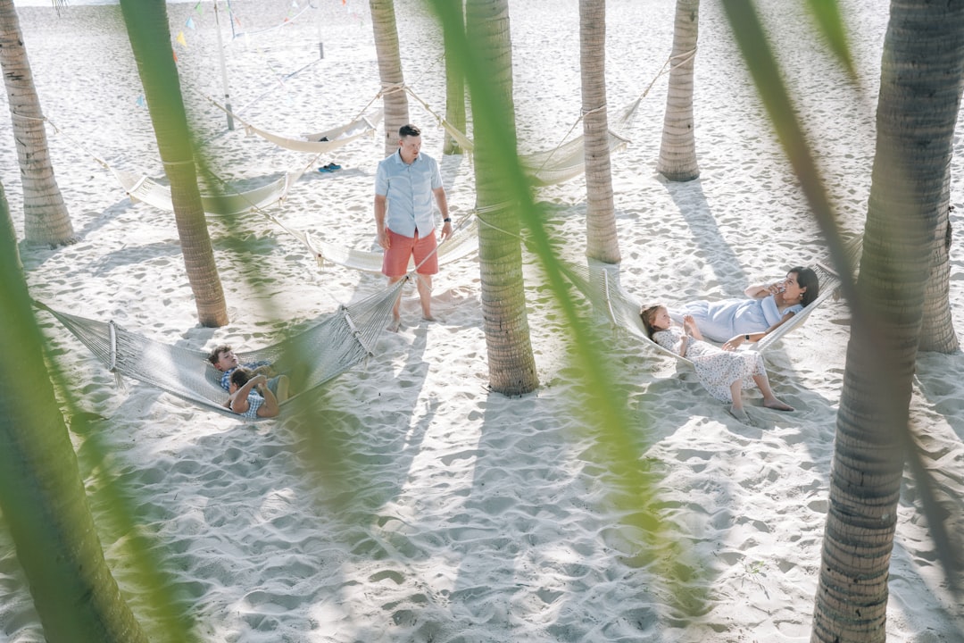 ❓ FAQ: Your Top Florida Family Vacation Questions Answered by Florida Getaways a group of people riding skis on top of a pole