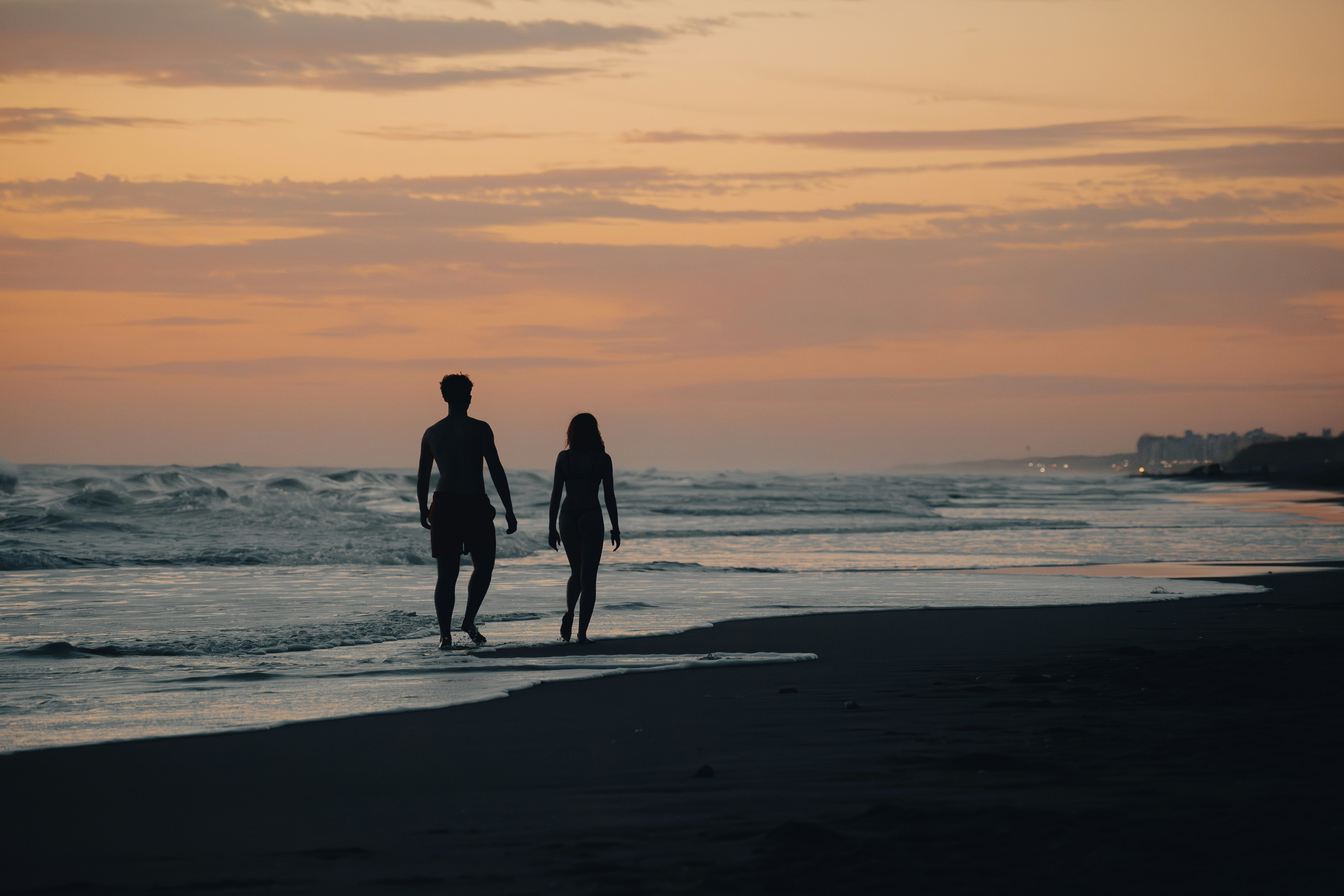 Conclusion: Your Perfect Florida Budget Getaway Awaits! by Florida Getaways a man and a woman walking on the beach at sunset